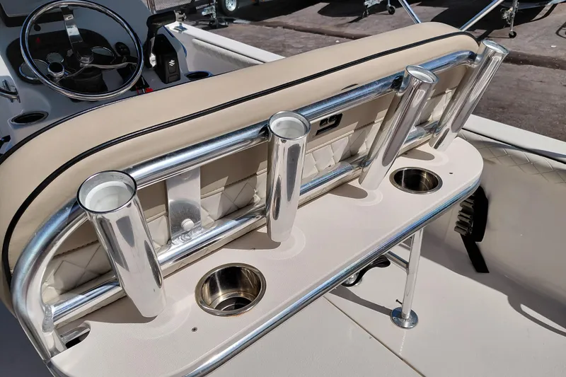 Slide: The Image of 2021 Carolina Skiff 21 LS boat console with rod holders and cup holders. - 29
