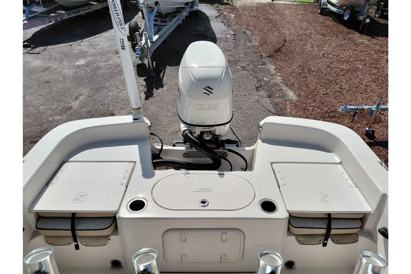 Slide: The Image of 2021 Carolina Skiff 21 LS boat with Suzuki 140 outboard motor, rear view. - 34