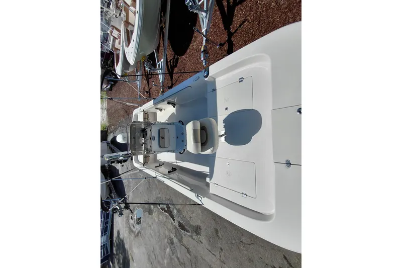 Slide: The Image of 2021 Carolina Skiff 21 LS boat, top view, showcasing deck layout and seating arrangement. - 37