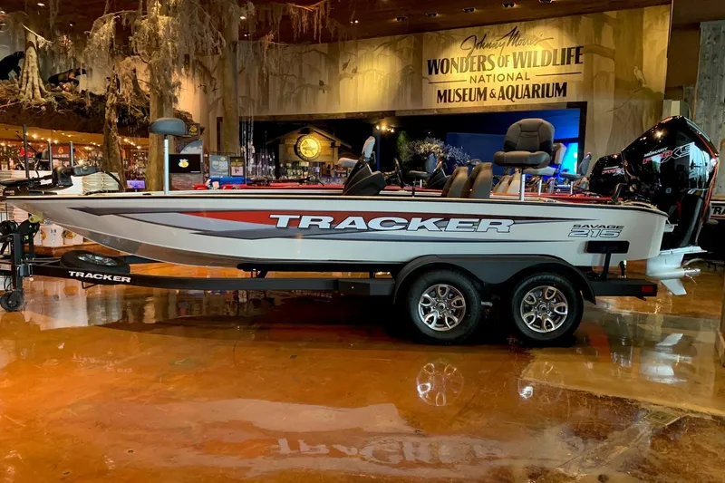 The Image of 2026 Tracker Savage 215 boat displayed indoors at Wonders of Wildlife Museum. - 0