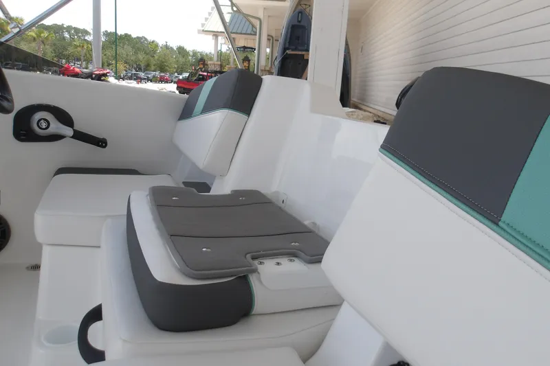 Slide: The Image of 2026 Tahoe T18 boat interior with modern seating and sleek design. - 14