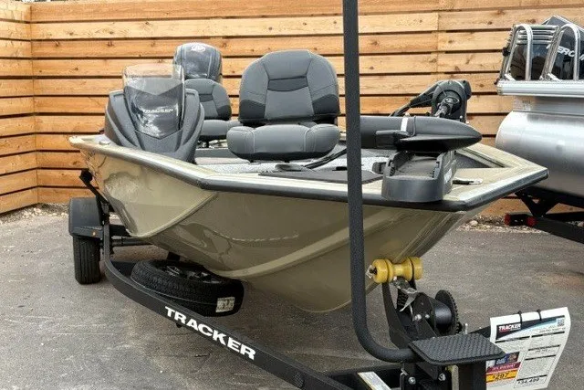 The Image of 2026 Tracker Pro Team 190 boat on trailer, parked outdoors. - 0