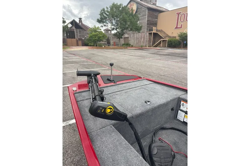 Slide: The Image of 2026 Tracker Panfish 17 boat with trolling motor in parking lot. - 4