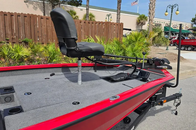 Slide: The Image of 2026 Tracker Pro Team 175 boat with red trim and fishing seat. - 17