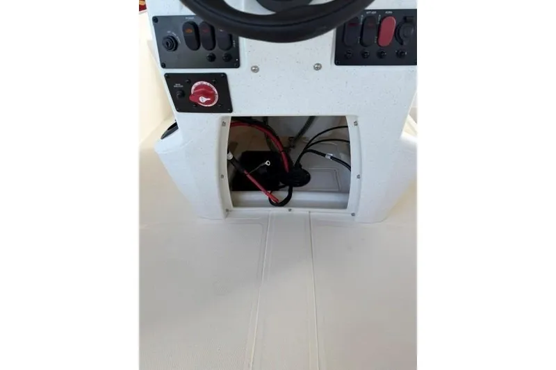 Slide: The Image of Console of 2026 Mako Pro Skiff 17 CC boat with control panel and wiring. - 10