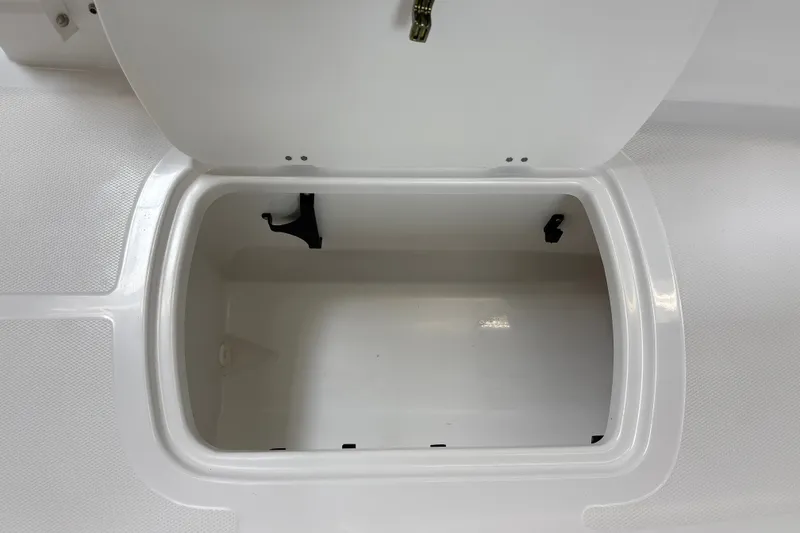 Slide: The Image of Open storage compartment in 2026 Tahoe T18 boat, showcasing spacious interior design. - 22
