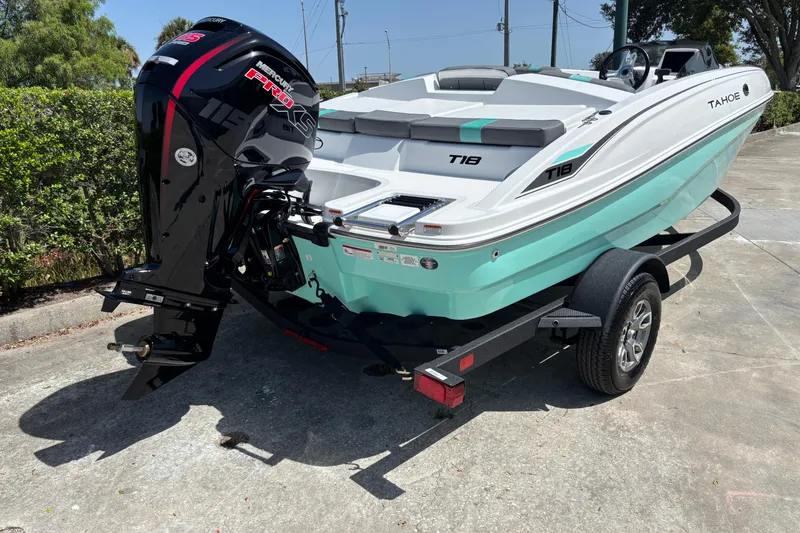 Slide: The Image of 2026 Tahoe T18 boat on trailer with Mercury Pro XS outboard motor. - 6