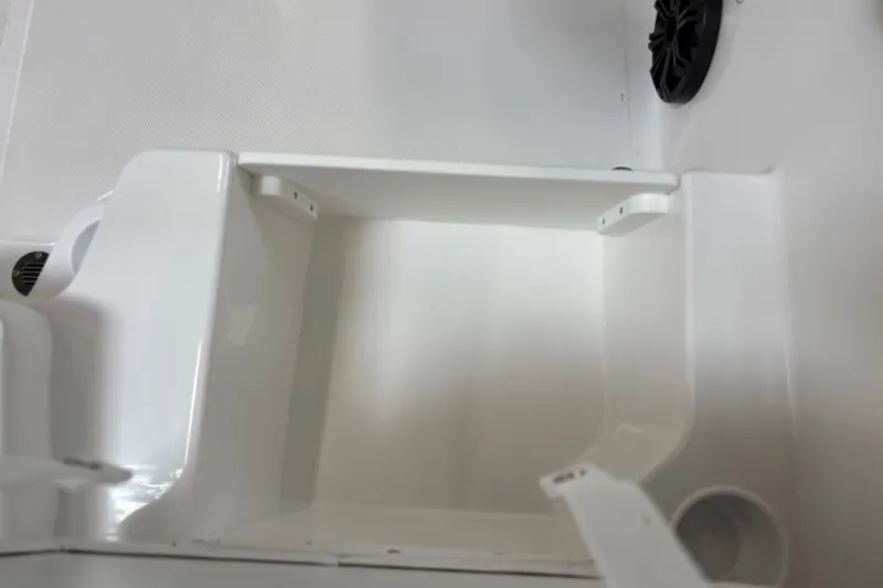 Slide: The Image of A white boat seat with a speaker and brackets on the side. - 20