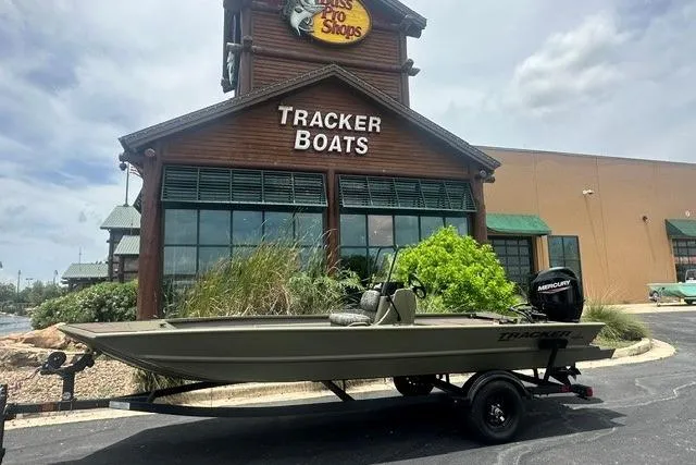 The Image of 2026 Tracker Grizzly 1860 CC boat displayed outside Tracker Boats store. - 0