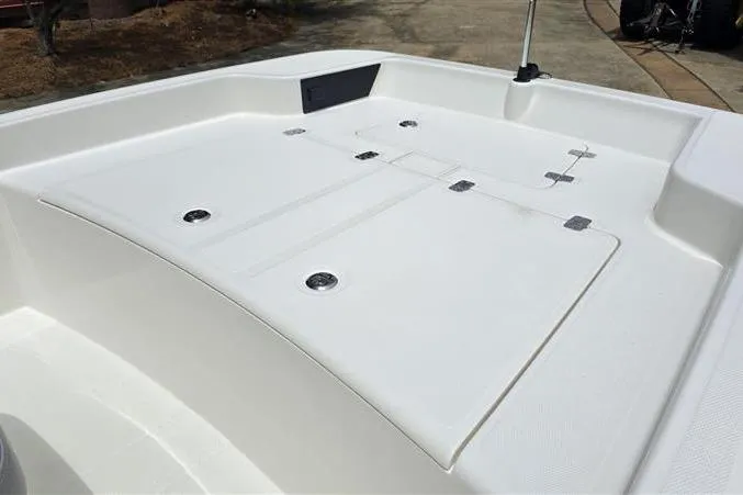 Slide: The Image of 2026 Mako Pro Skiff 15 CC boat deck, featuring a spacious and sleek design. - 10