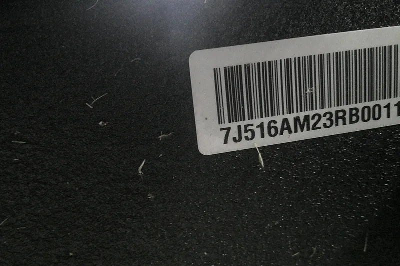Slide: The Image of Barcode label on 2024 Nitro Z21 XL surface with serial number 7J516AM23RB0011. - 17