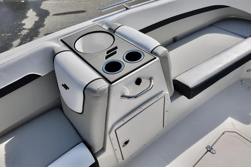 Slide: The Image of Interior of 2026 Starcraft SVX 211 OB boat with seating and cup holders. - 8