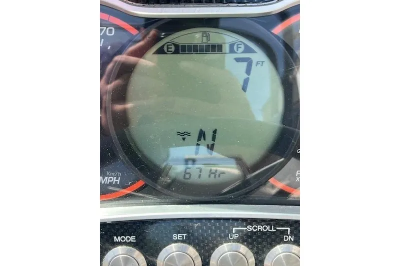Slide: The Image of Dashboard of a 2016 Chaparral Vortex 203 VR boat showing fuel and depth. - 12