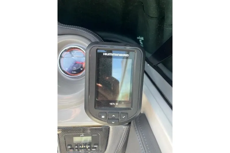 Slide: The Image of Humminbird fish finder on 2016 Chaparral Vortex 203 VR dashboard. - 15