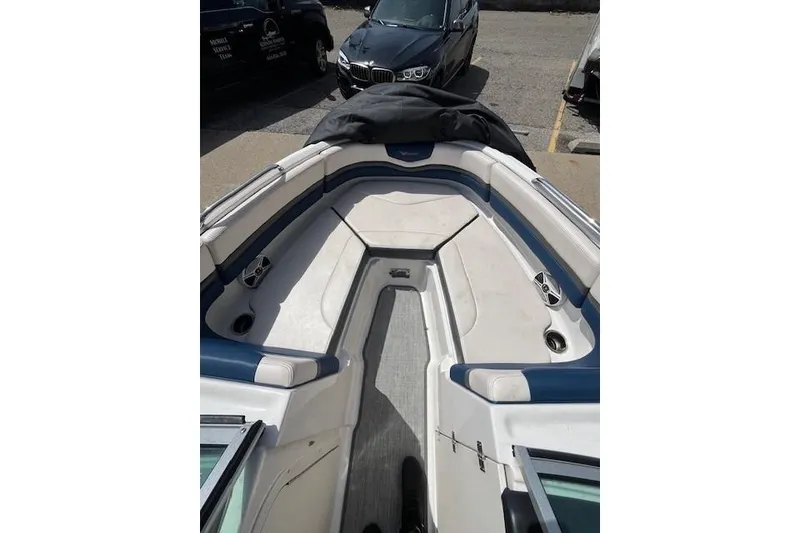 Slide: The Image of 2016 Chaparral Vortex 203 VR boat interior with blue and white seating. - 9