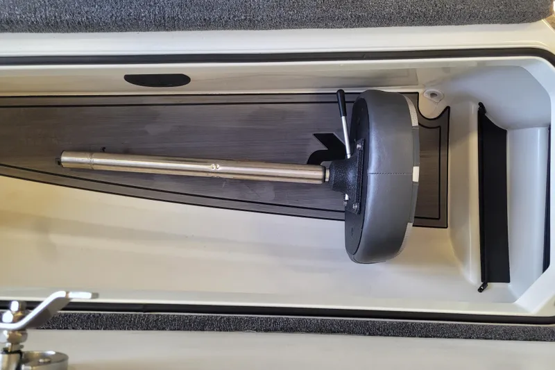 Slide: The Image of 2023 Ranger Z521R boat storage compartment with mounted seat pedestal. - 12