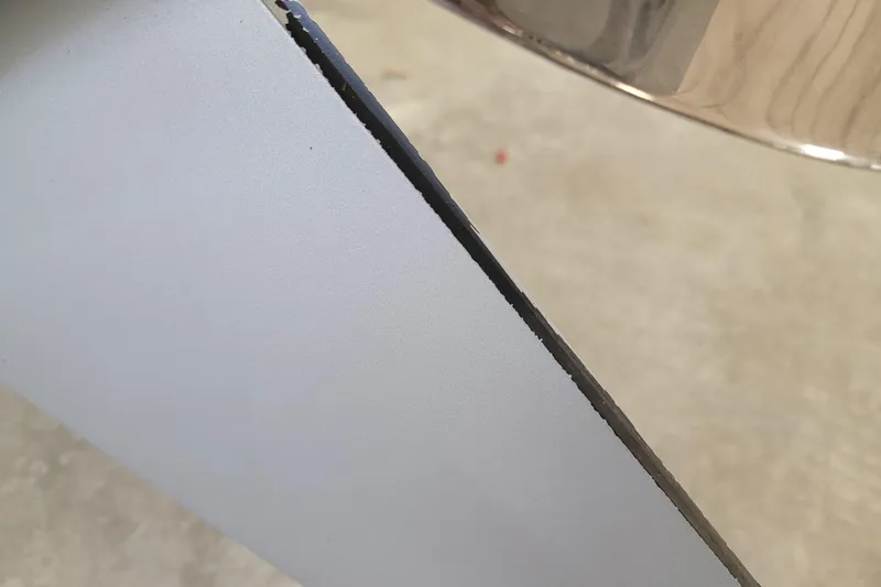 Slide: The Image of Close-up of 2023 Ranger Z521R boat's sharp-edged metallic component. - 3
