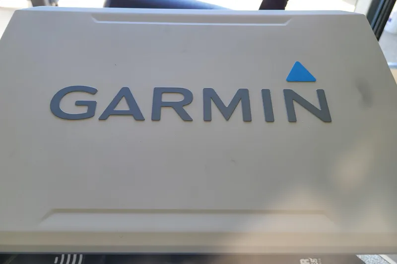 Slide: The Image of Garmin logo on a 2023 Ranger Z521R boat dashboard. - 30