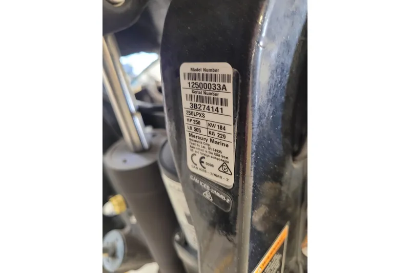 Slide: The Image of Label on 2023 Ranger Z521R boat engine, displaying model and serial numbers. - 35