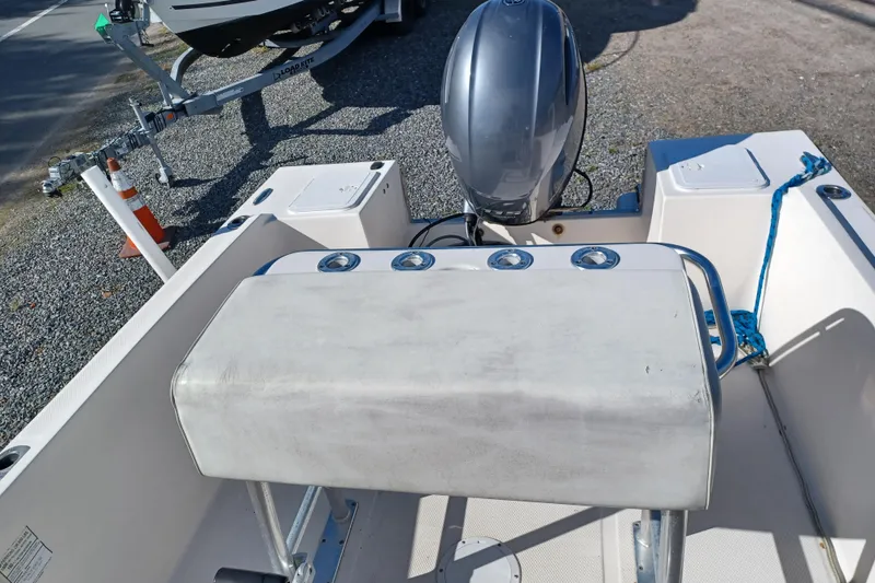 Slide: The Image of 2005 Key West 1900 Center Console boat interior with motor and seating. - 11