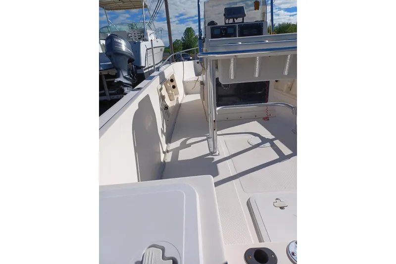 Slide: The Image of 2005 Key West 1900 Center Console boat interior with seating and controls. - 4