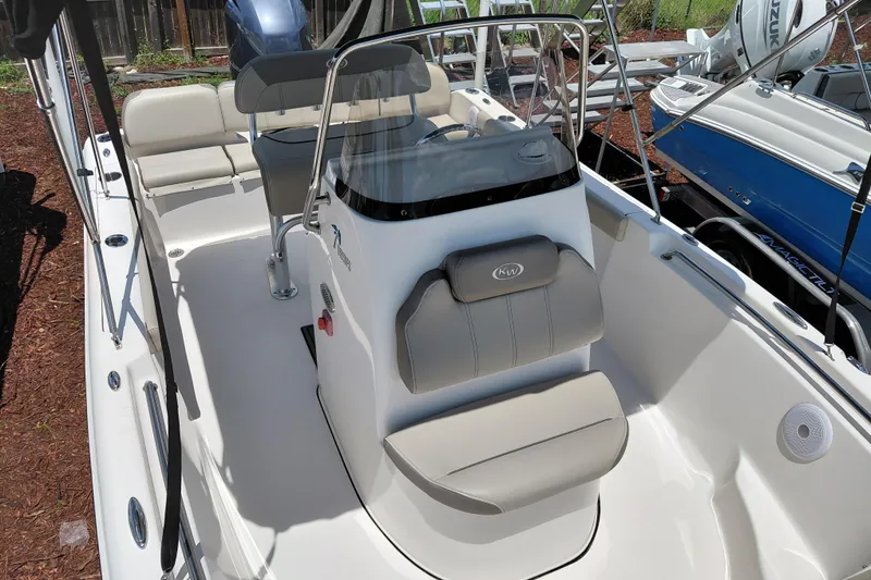 Slide: The Image of 2023 Key West 189 FS boat interior with seating and console. - 12