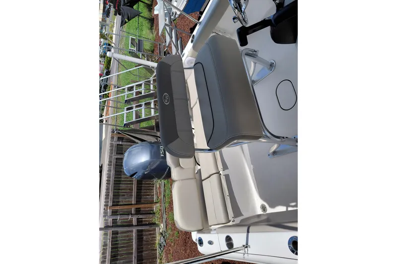 Slide: The Image of 2023 Key West 189 FS boat interior with seating and Yamaha outboard motor. - 20