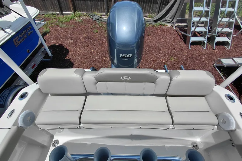 Slide: The Image of 2023 Key West 189 FS boat with Yamaha 150 engine and cushioned seating. - 27