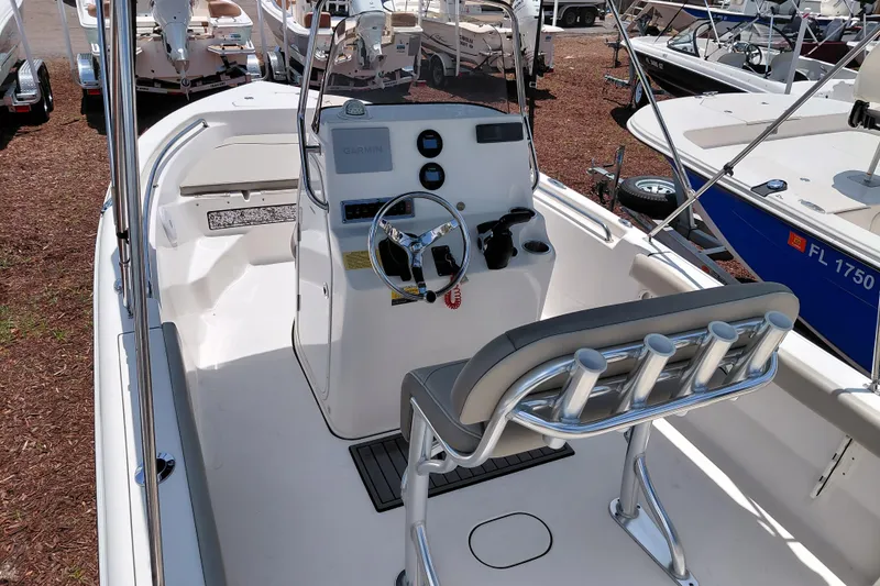 Slide: The Image of 2023 Key West 189 FS boat interior with steering console and seating. - 28