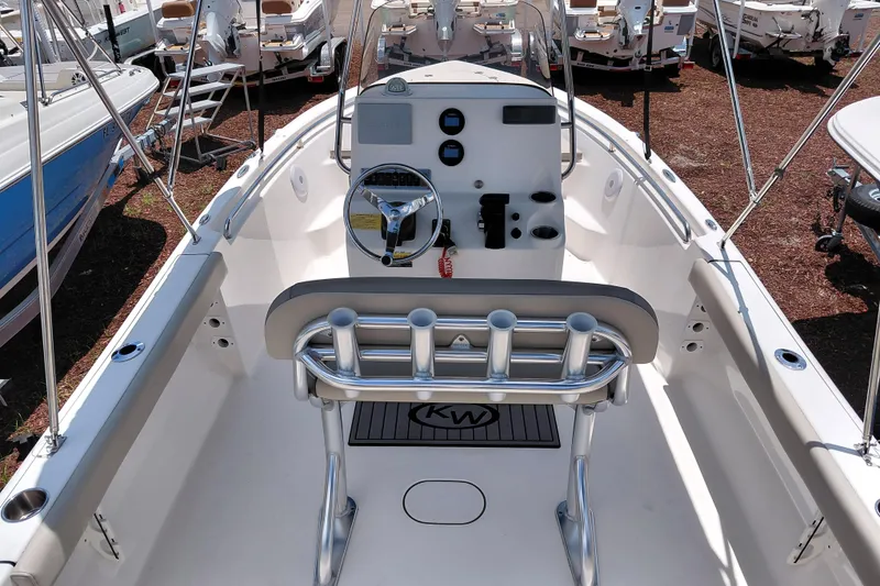 Slide: The Image of 2023 Key West 189 FS boat interior with steering console and seating. - 30