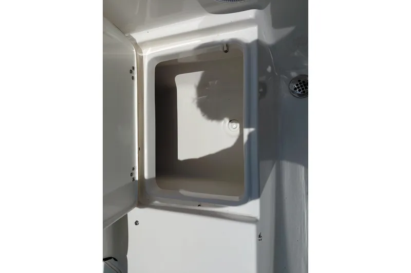 Slide: The Image of Open storage compartment on 2023 Key West 189 FS boat, showcasing interior space. - 34