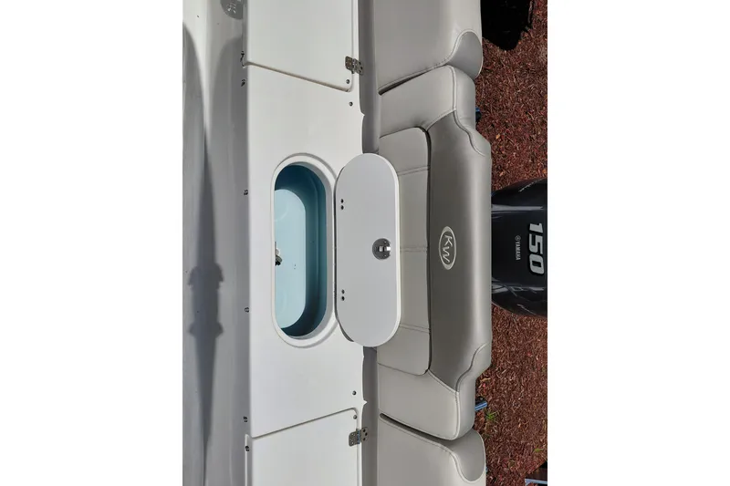 Slide: The Image of 2023 Key West 189 FS boat interior with Yamaha 150 engine. - 35