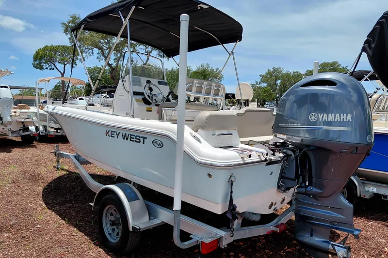 Slide: The Image of 2023 Key West 189 FS boat with Yamaha engine on trailer. - 4