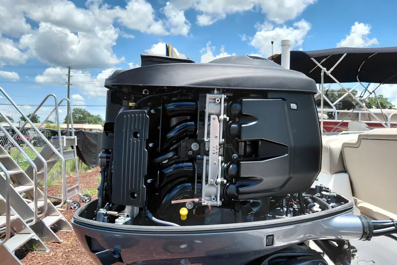 Slide: The Image of 2023 Key West 189 FS boat engine under a clear blue sky. - 40