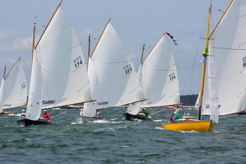 Slide: The Image of Sailboats racing on the water, featuring Crosby Wianno Senior models, 1998. - 6