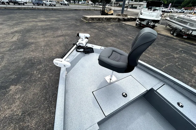 Slide: The Image of 2026 Xpress H20B Bay boat with a sleek design and comfortable seating. - 13