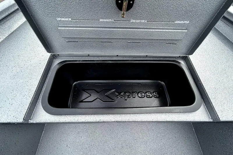Slide: The Image of Open storage compartment of 2026 Xpress H20B Bay boat. - 20