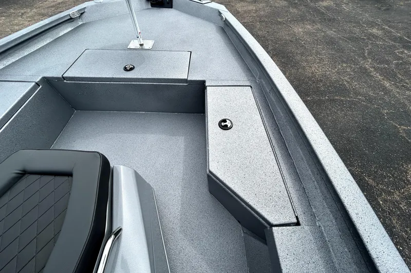 Slide: The Image of 2026 Xpress H20B Bay boat interior with sleek seating and storage compartments. - 21