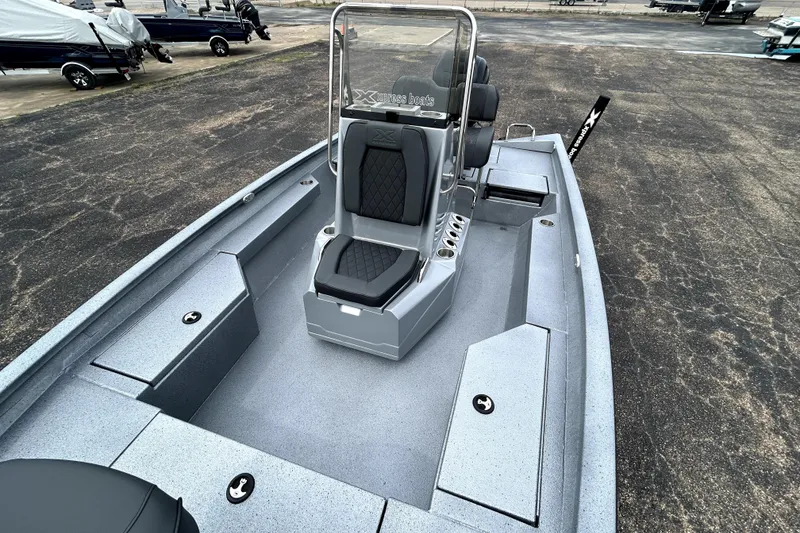 Slide: The Image of 2026 Xpress H20B Bay boat with sleek seating and spacious deck design. - 28