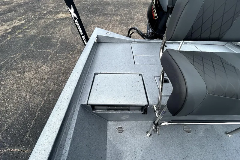 Slide: The Image of 2026 Xpress H20B Bay boat interior with seating and storage compartments. - 31
