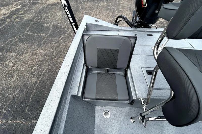 Slide: The Image of 2026 Xpress H20B Bay boat interior with gray seating and sleek design. - 32