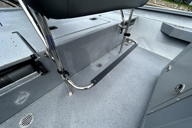 Slide: The Image of Interior of 2026 Xpress H20B Bay boat, featuring sleek seating and durable flooring. - 36