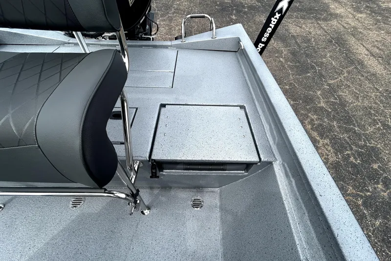 Slide: The Image of 2026 Xpress H20B Bay boat interior with seating and storage compartment. - 37