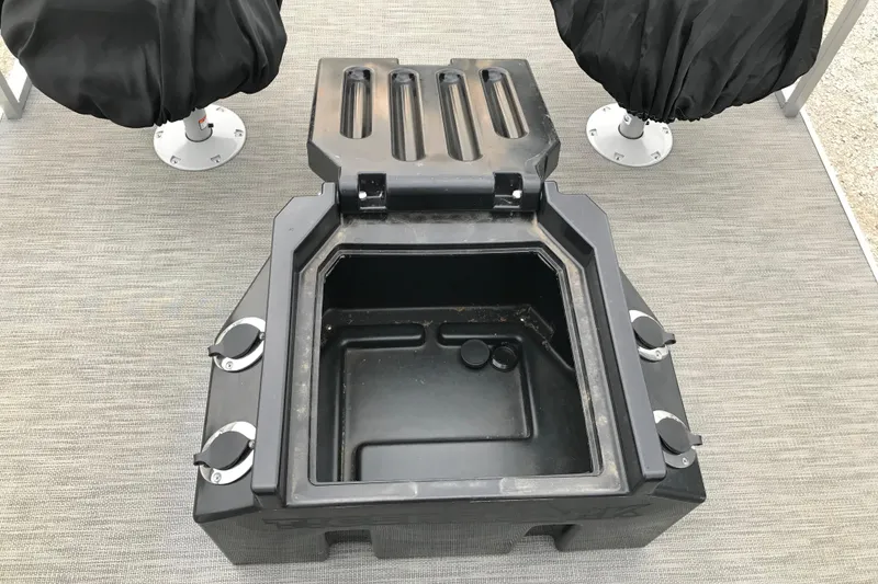 Slide: The Image of Open storage compartment on 2024 Tigershark 700 12' Mini Pontoon boat. - 9