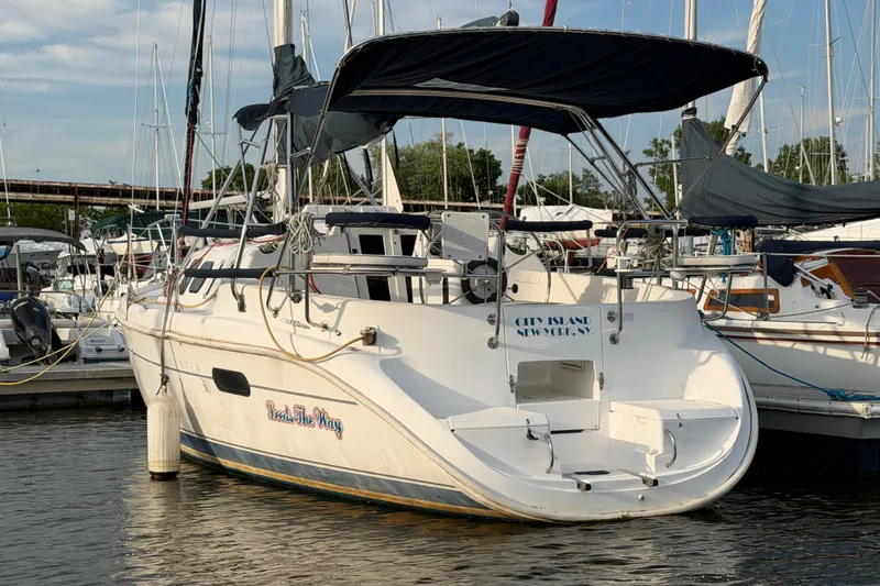 Slide: The Image of Hunter 310 sailboat, 2000 model, docked at marina, City Island, New York. - 3