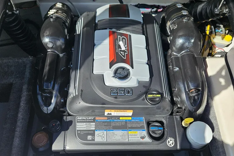 Slide: The Image of 2021 Glastron GTS 205 boat engine, featuring a Mercury 4.5L 250 horsepower motor. - 14