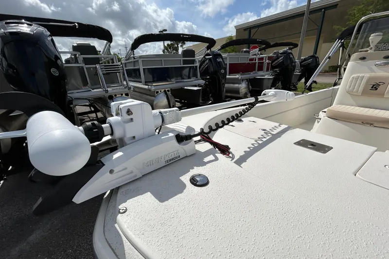Slide: The Image of 2015 Carolina Skiff JVX18CC boat with Minn Kota Terrova trolling motor. - 14