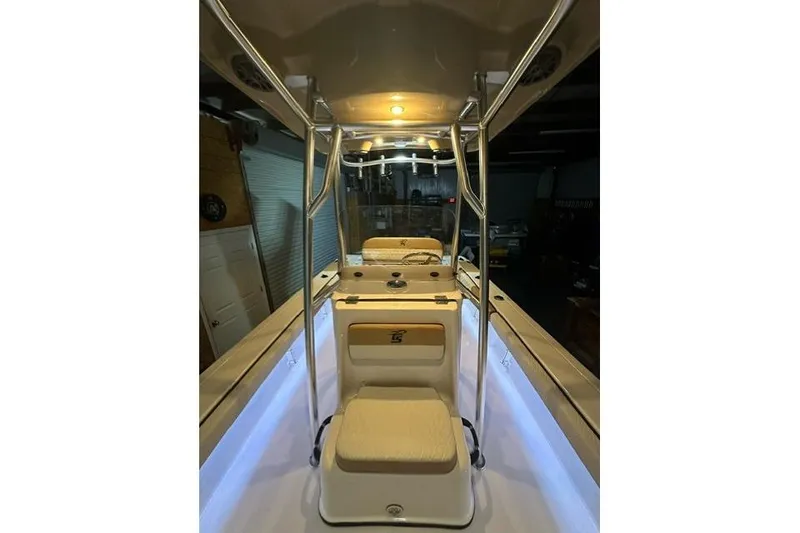 Slide: The Image of 2025 Carolina Skiff 22 Ultra Elite boat interior with illuminated seating and console. - 3