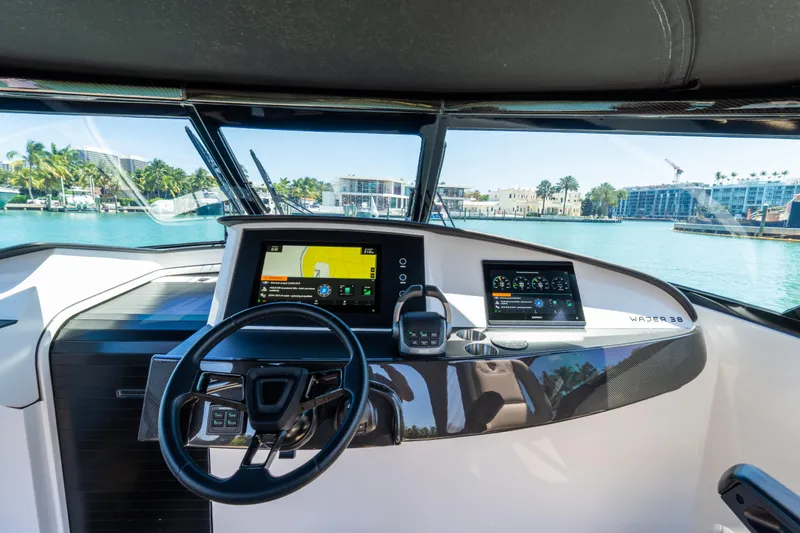 Slide: The Image of Cockpit view of 2022 Wajer 38 yacht with modern navigation displays. - 10
