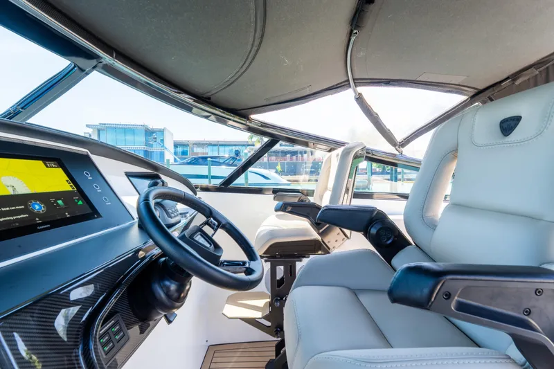 Slide: The Image of Interior of 2022 Wajer 38 boat with modern dashboard and luxurious seating. - 11